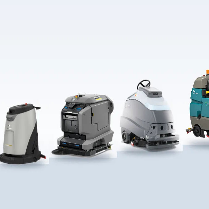 Five robotic floor scrubbers on rising steps from smallest to largest: ICE Cobi 18, Gausium Scrubber 50, Kärcher KIRA B 50, Nilfisk Liberty SC50 and Tennant T7AMR