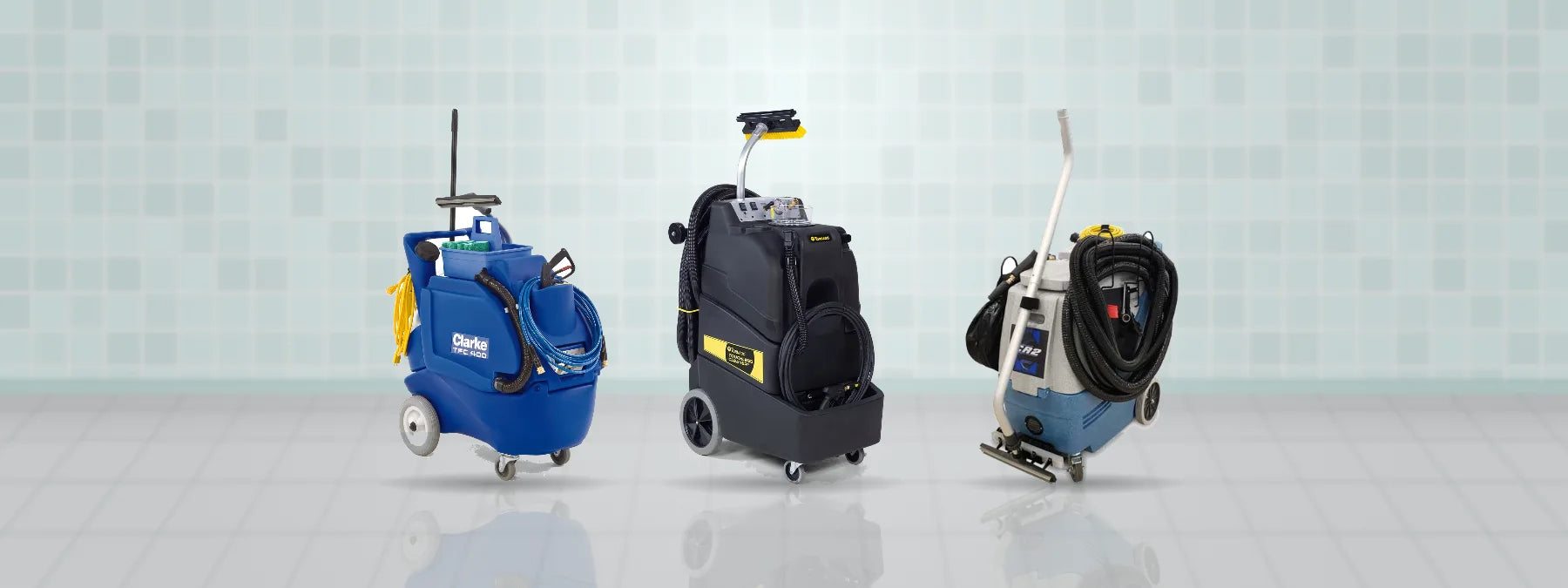Clarke TFC 400, Tornado Touchless Cleaner and EDIC CR2 touchless restroom cleaners on a tiled restroom floor