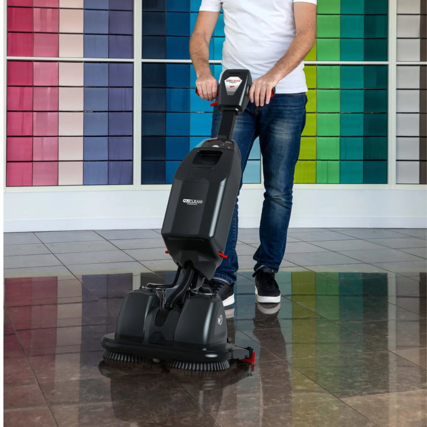 NaceCare 440NX Ultra-Compact Scrubber Trolley in use cleaning tile in open room