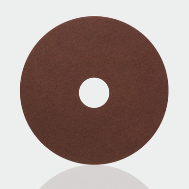 Orbot AkwaStrip brown stripping pad, round pad on a white background