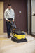 Tornado BR 16/3 Compact Automatic Floor Scrubber Being Used Indoors by Operator