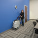 Operator cleaning office carpet with the ES300 XP