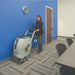 Operator cleaning conference room carpet with the ES400 XLP