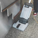 SC100 cleaning along a wall and stair edge