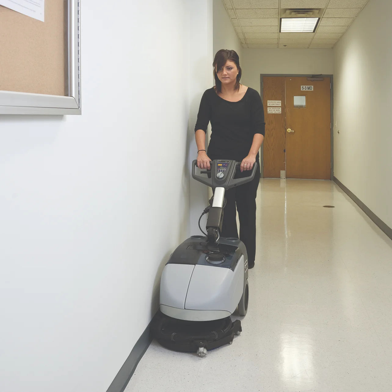 Scrubbing an office hallway with the SC351