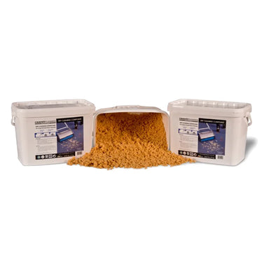 Carpet Cleaner America dry carpet cleaning compound buckets with the tan compound granules poured out between them