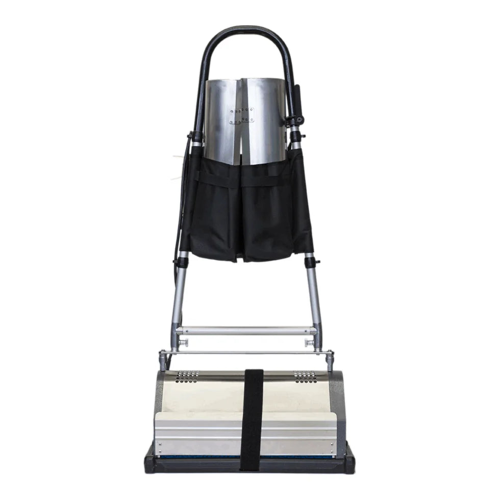 Black three-pocket CRB accessory holder strapped to the handle uprights of a CRB machine, holding the renovator trays