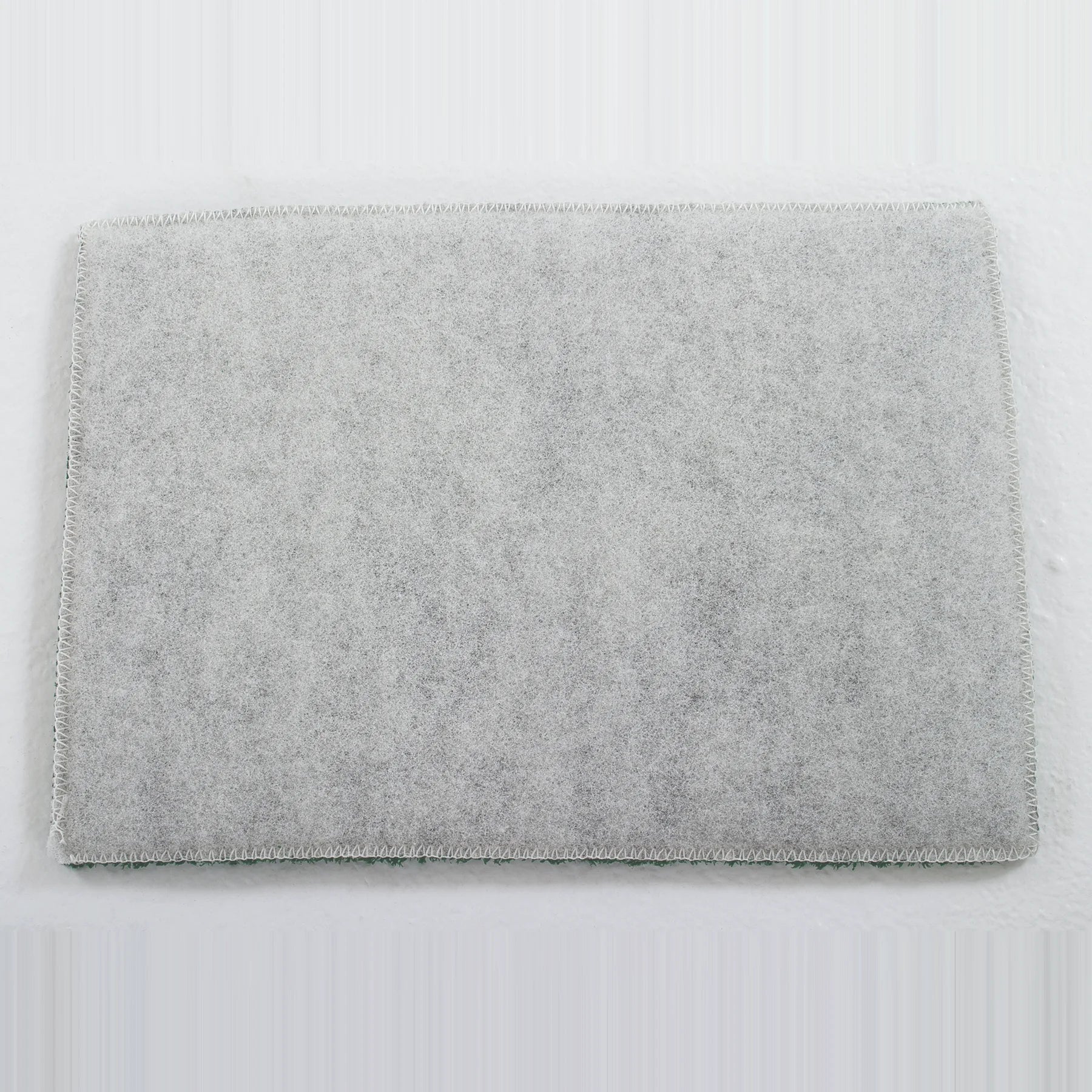 Back of the Clarke 56383923 14 x 20 inch grout pad