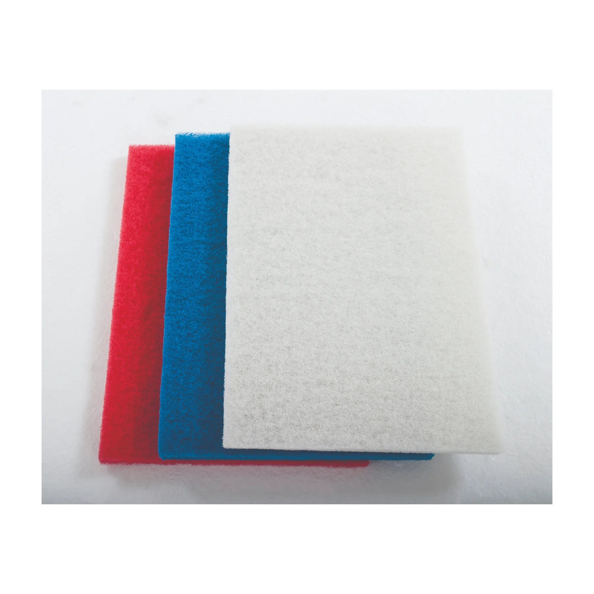 Red, blue and white Clarke BOOST rectangular floor pads fanned out side by side