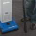 Clarke CarpetMaster 112 wand and crevice tool cleaning along a baseboard