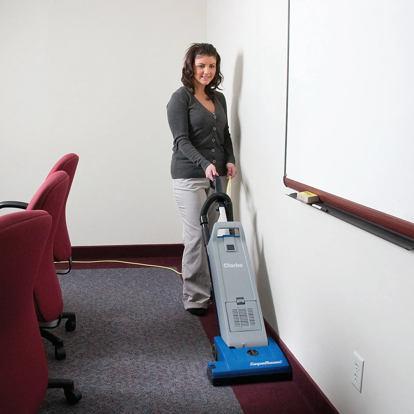 Clarke CarpetMaster 115 vacuuming the carpet edge along a wall