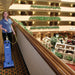 Housekeeper vacuuming a hotel atrium walkway with a Clarke CarpetMaster 212