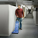 Clarke CarpetMaster 215 vacuuming carpet along the wall of an office hallway