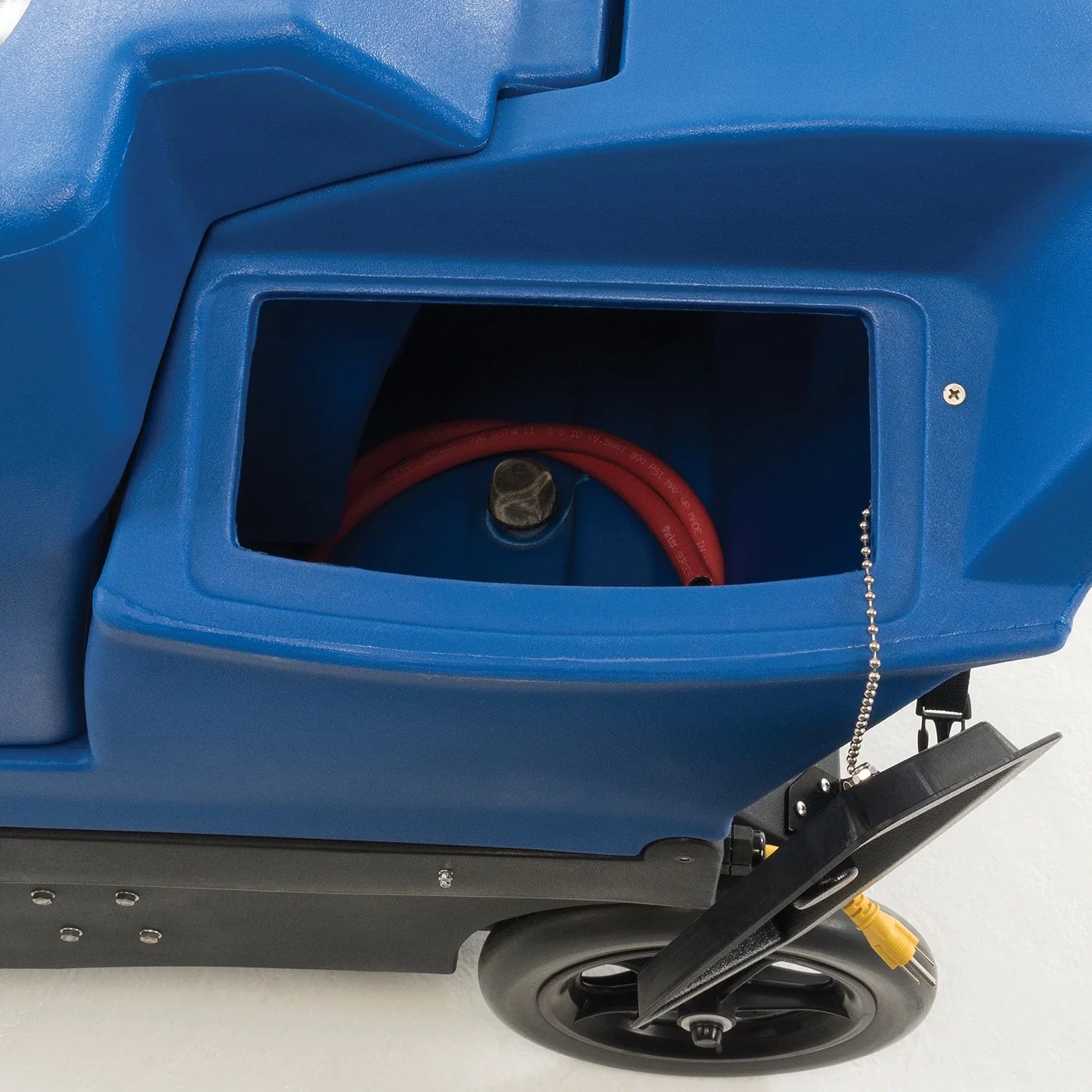 Close-up of the Clarke EX20 solution tank fill port, set low on the side away from the switches