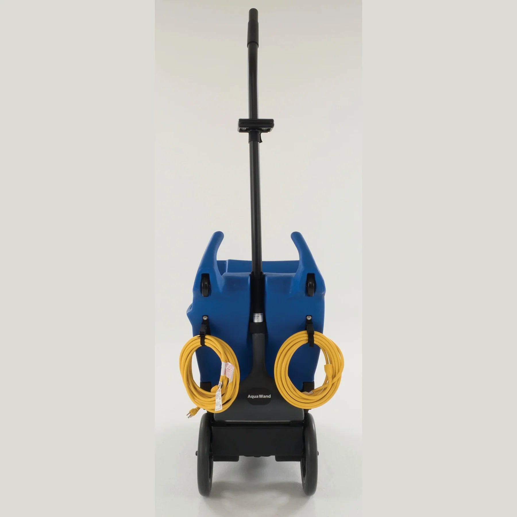 Rear of the Clarke EX20 carpet extractor with yellow power cords coiled on the cord wraps and the wand in its caddy