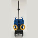 Rear of the Clarke EX20 carpet extractor with yellow power cords coiled on the cord wraps and the wand in its caddy