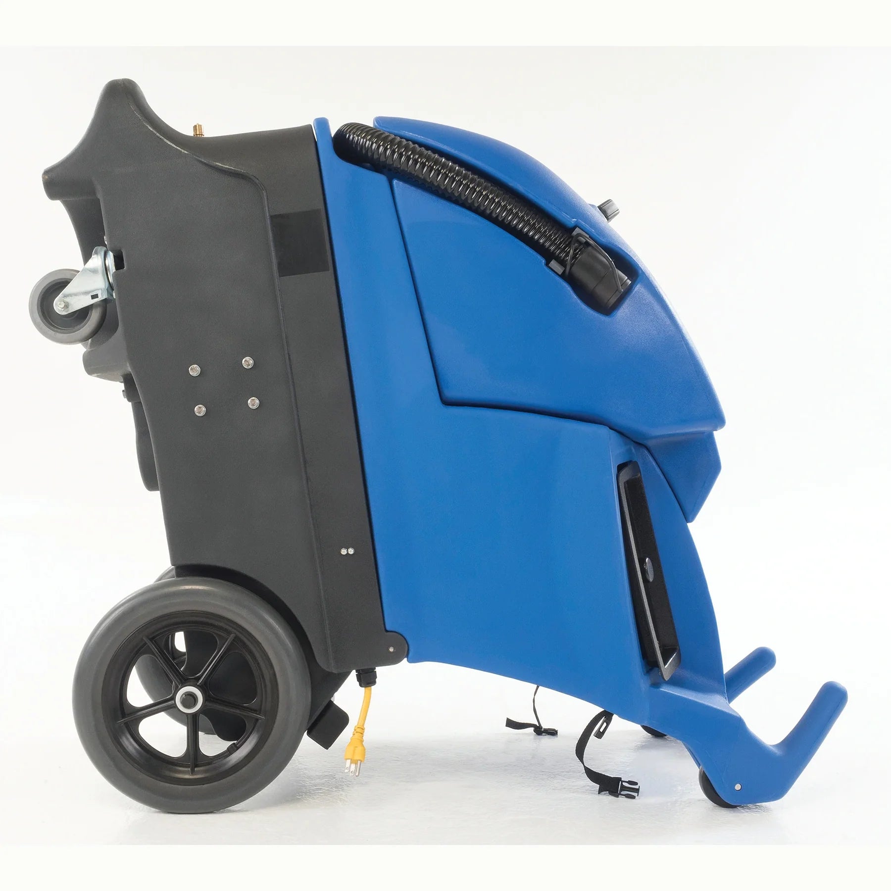 Clarke EX20 carpet extractor tipped back onto its rear wheels for moving, with the front loading wheels visible underneath