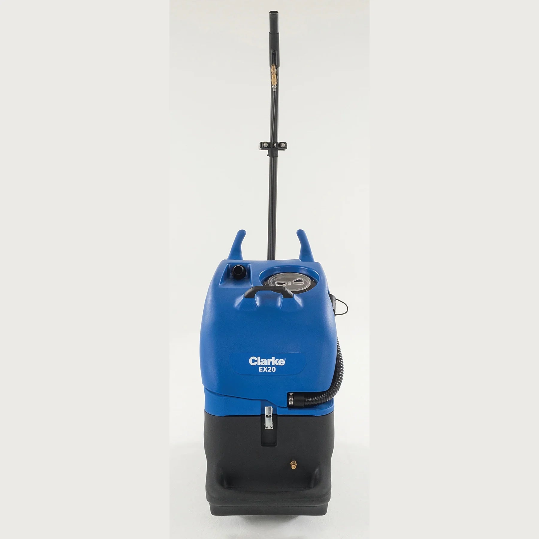 Front of the Clarke EX20 carpet extractor with the scrub wand in the wand caddy and the recovery tank drain hose on the side