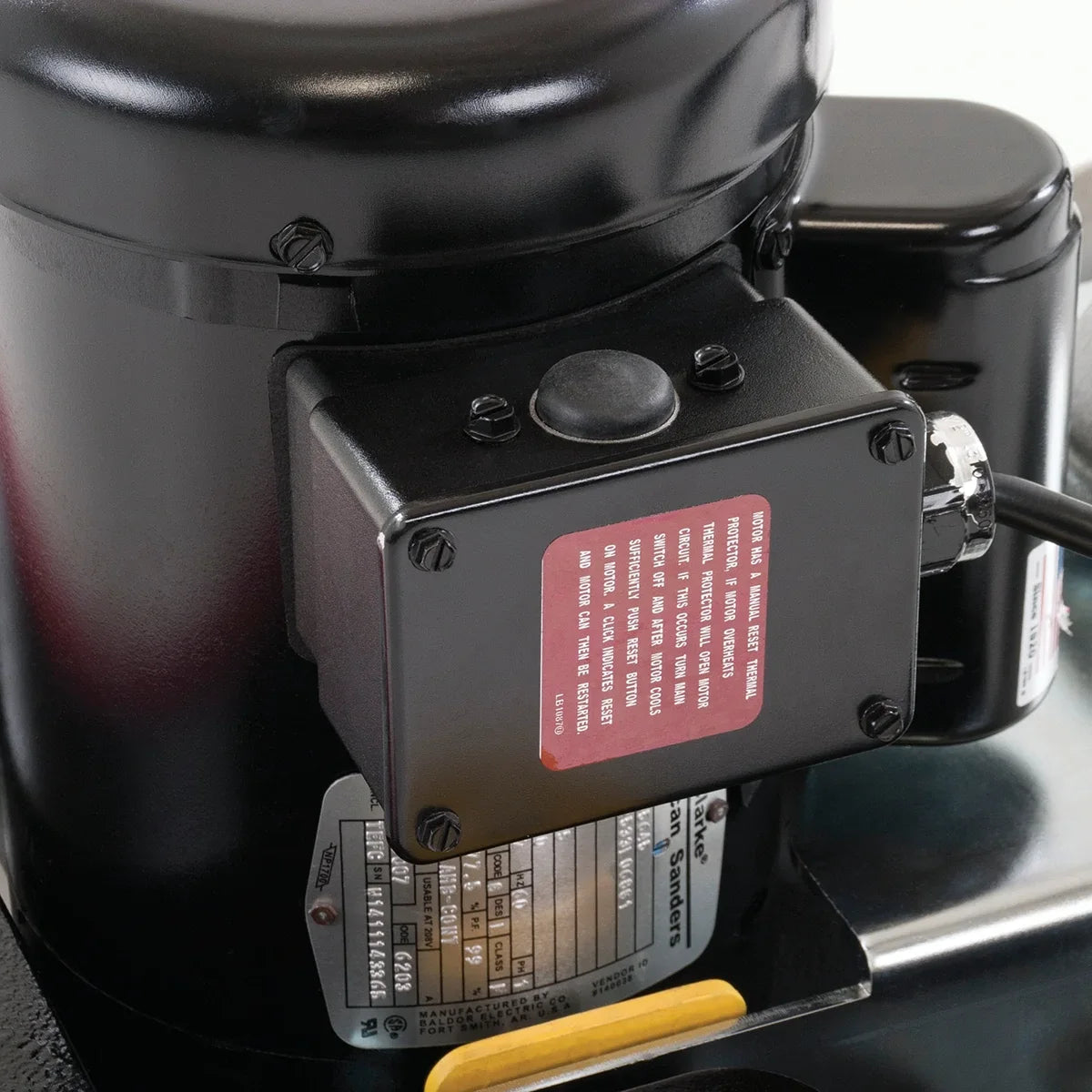 Close-up of the manual reset button on the Clarke FM40 LX