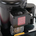 Close-up of the manual reset button on the Clarke FM40 LX