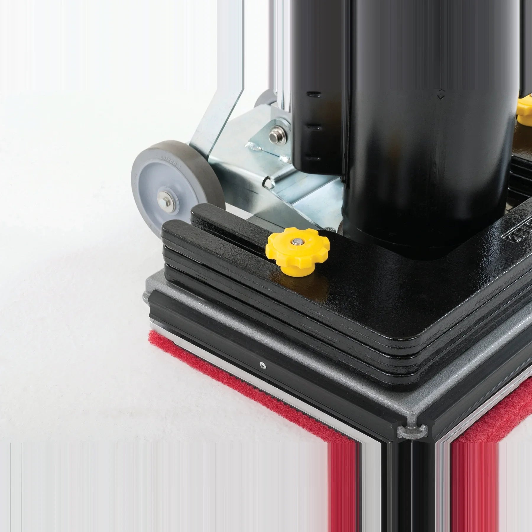 The three 21 lb weights mounted on the base of the Clarke FM40 ST