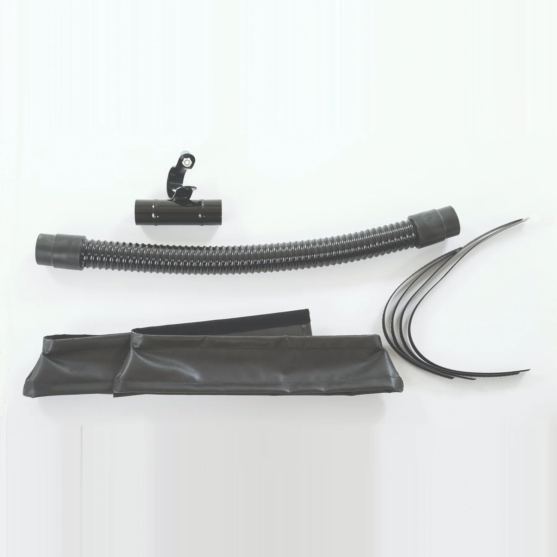 Parts of the Clarke FM40 vacuum skirt kit laid out side by side