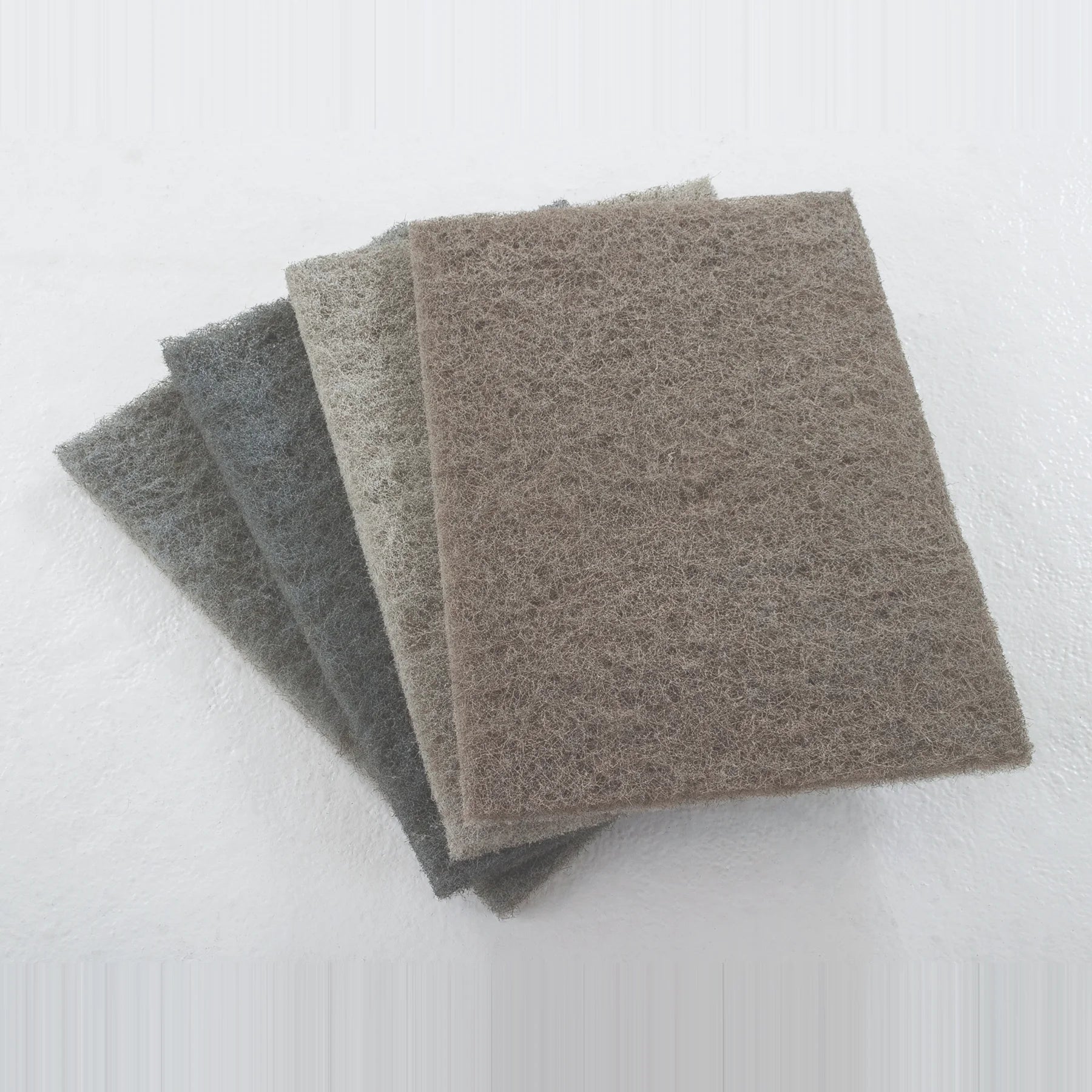 Clarke Gorilla diamond floor pads, 14 x 20 inch, stacked by grit