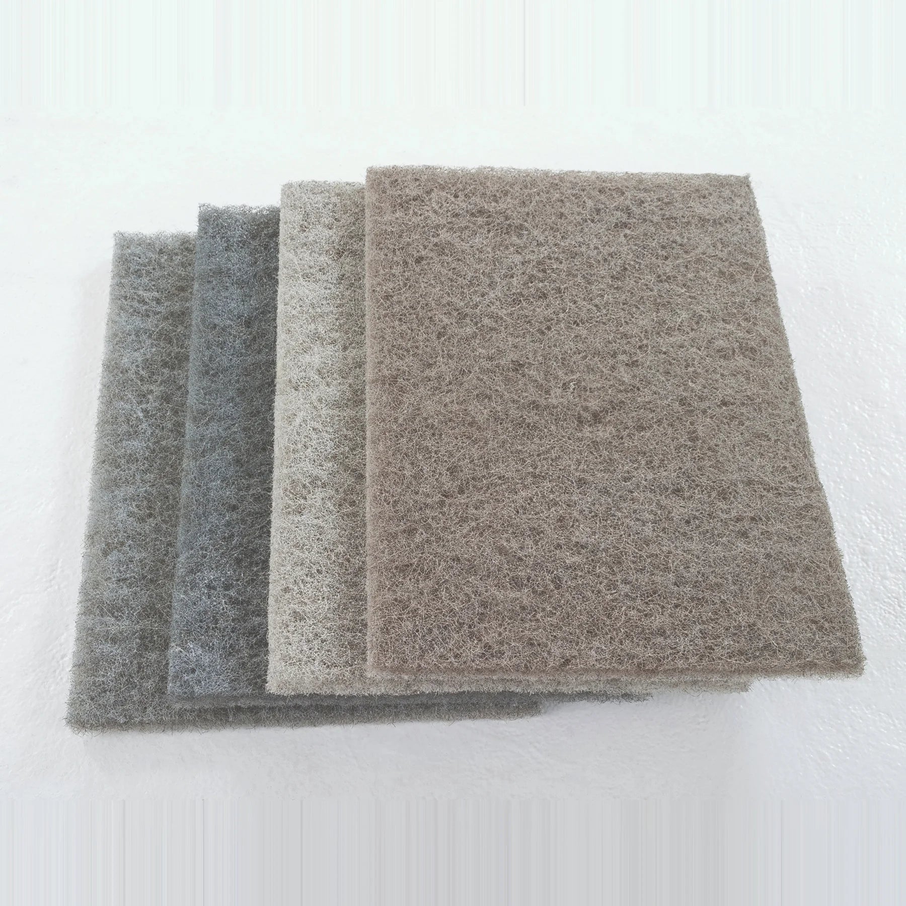 Clarke Gorilla 14 x 20 inch diamond floor pads in four grits, fanned out