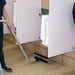 Vacuuming a restroom floor dry with the EDIC dual head squeegee wand and CR2
