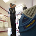 Touch-free spray cleaning a restroom with the EDIC Endeavor and spray gun