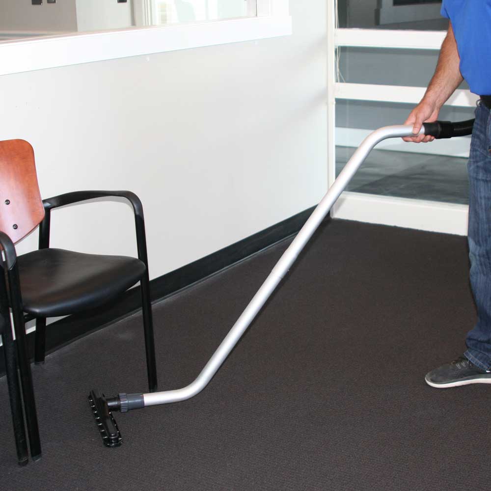 EDIC Atlas backpack vacuum with the two-piece aluminum S-bend wand
