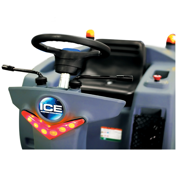 Front three-quarter view of the ICE iS1100L+ ride-on sweeper showing the steering wheel, seat, beacon light and front LED lights