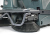 Close-up of the round side brush and front frame on the ICE iS1100L+ ride-on sweeper