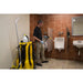 KaiVac 1250 No-Touch Cleaning machine in use cleaning a restroom urinal area