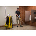 Yellow KaiVac 1250 machine on a tiled restroom floor during a cleaning job