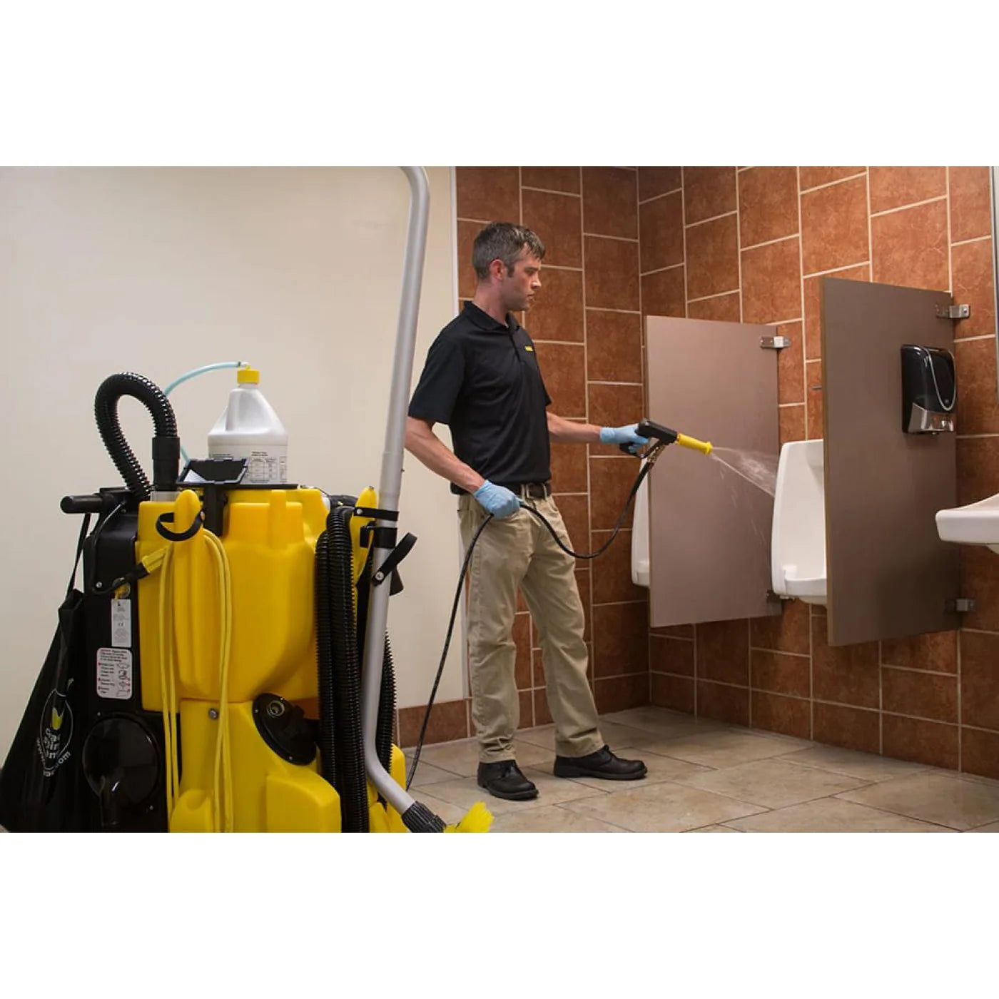 Pressure rinsing restroom fixtures with the KaiVac 1250 indoor pressure washer