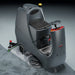 NaceCare CRL 2128 ride-on scrubber showing the operator seat and control panel