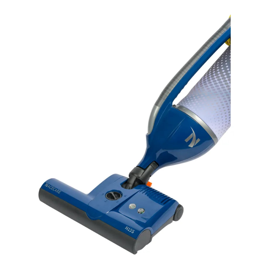 Low-profile power head of the NaceCare upright vacuum with the handle angled down