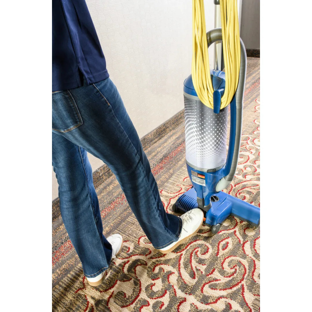 NaceCare swivel neck upright turning on patterned hotel carpet