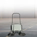 NaceCare NC 4 manual push sweeper on a concrete warehouse floor