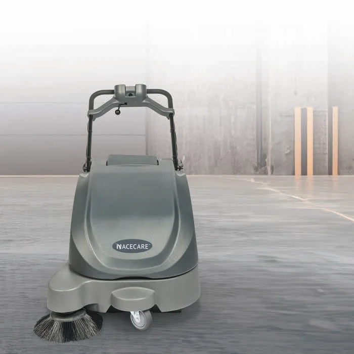 NaceCare NC 5 battery sweeper on a concrete warehouse floor