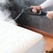 Steam-X bed bug steam gun treating the surface and seams of a mattress