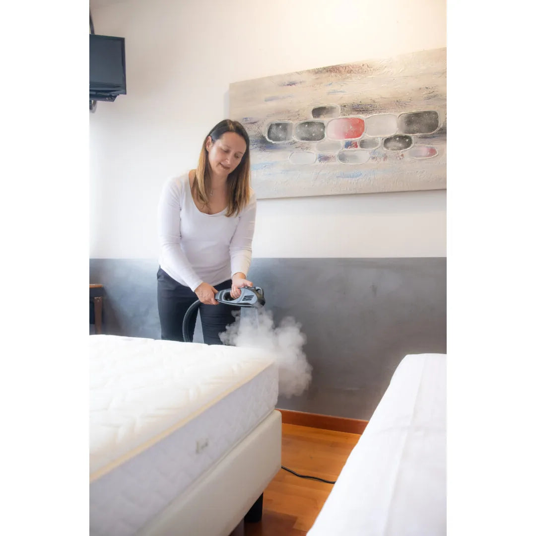 Close-up of the Steam-X nozzle treating a mattress