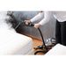 Technician steaming a mattress with the Steam-X bed bug steam gun