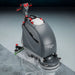 NaceCare TBL 1120 scrubbing a sealed floor, leaving a dry path behind the squeegee