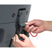 Operator unclipping a red hose plug on the side of the NaceCare TBL 2228T