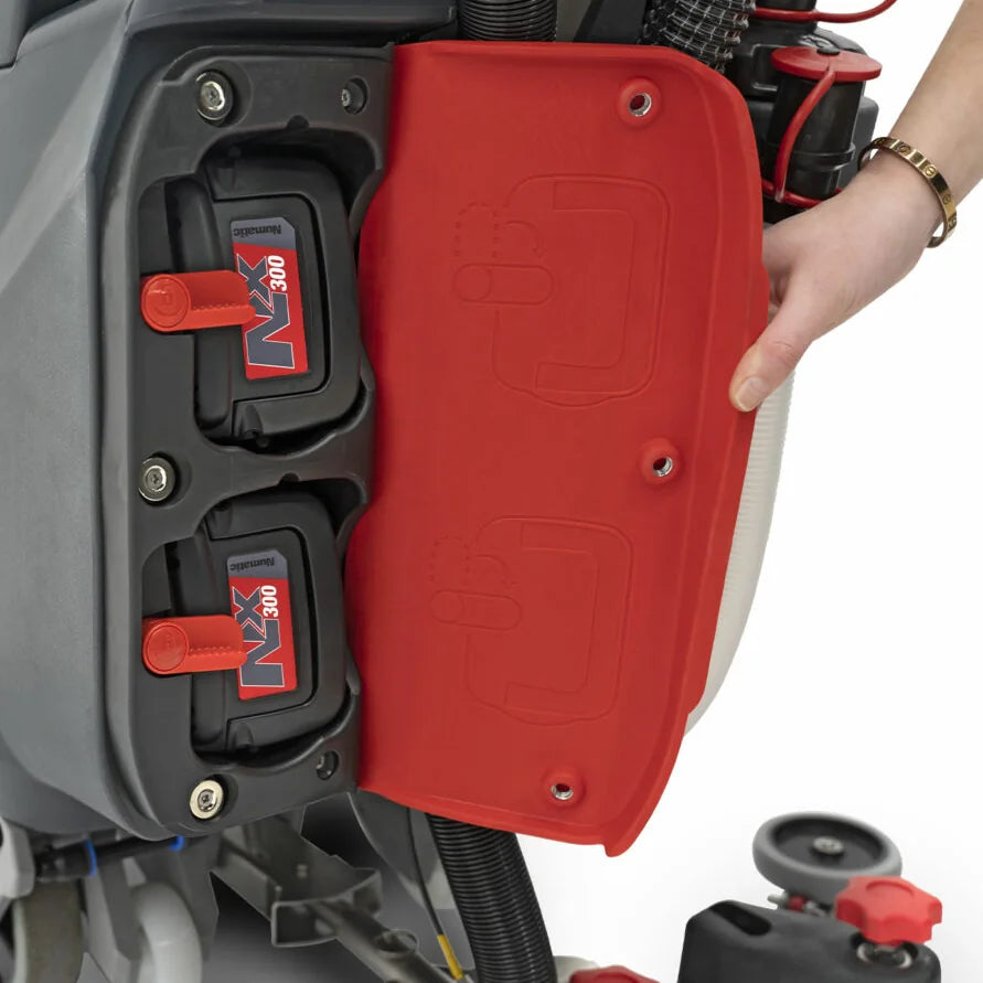 NaceCare TGB 817NX battery door open, showing where the two NX300 lithium batteries slot in