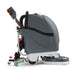 NaceCare TGB 817NX floor scrubber, right side profile showing the scrub deck at the front and the squeegee at the rear