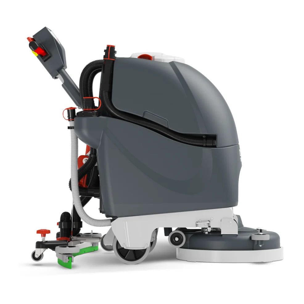 NaceCare TGB 817NX floor scrubber, right side profile showing the scrub deck at the front and the squeegee at the rear