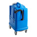 Rear of the TP 8X box extractor showing the carry handle, hose hook and casters
